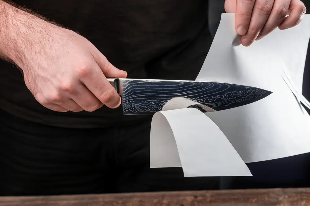 When a piece of paper or plastic is cut, how easily it is visible that the blade is cutting