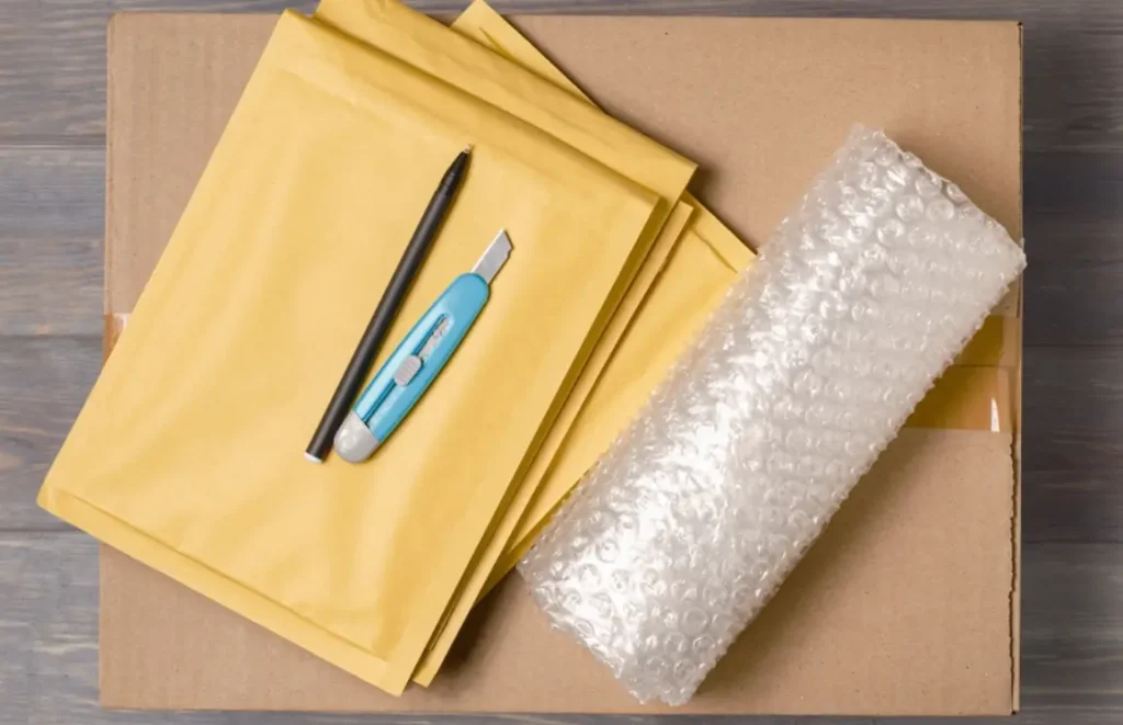 Packing with bubble wrap and paper helps protect the contents from damage during moving